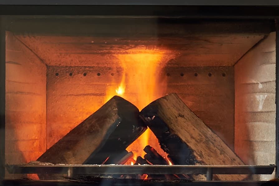 Warm fire glowing in a fireplace